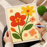Creating handmade sweet red and yellow flowers punch needle artwork