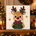 Finished sweet reindeer with gift bow pearl diamond painting artwork displayed as holiday home decor