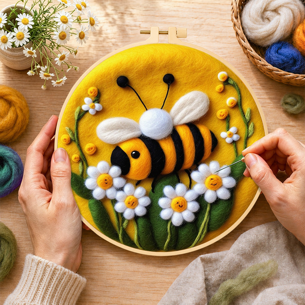 Creating the sweet smiling bee with daisies wool painting by hand with a felting needle