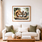Finished sweet squirrels sharing nuts cross stitch artwork displayed as home decor