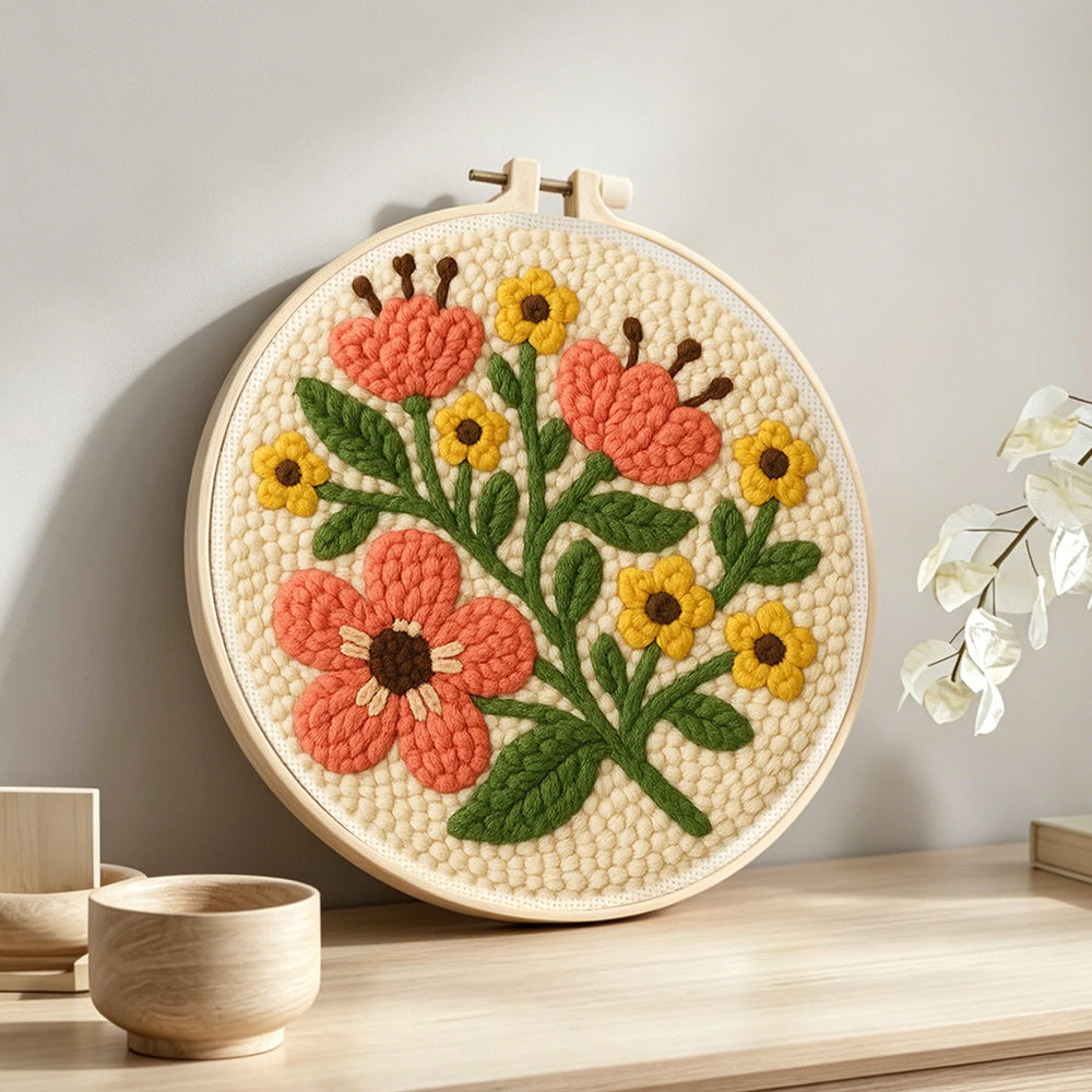 Sweet yellow and orange flowers punch needle artwork displayed on a table