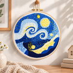 Swirling starry sky art embroidery hoop wall art displayed as warm and cozy handmade home decor