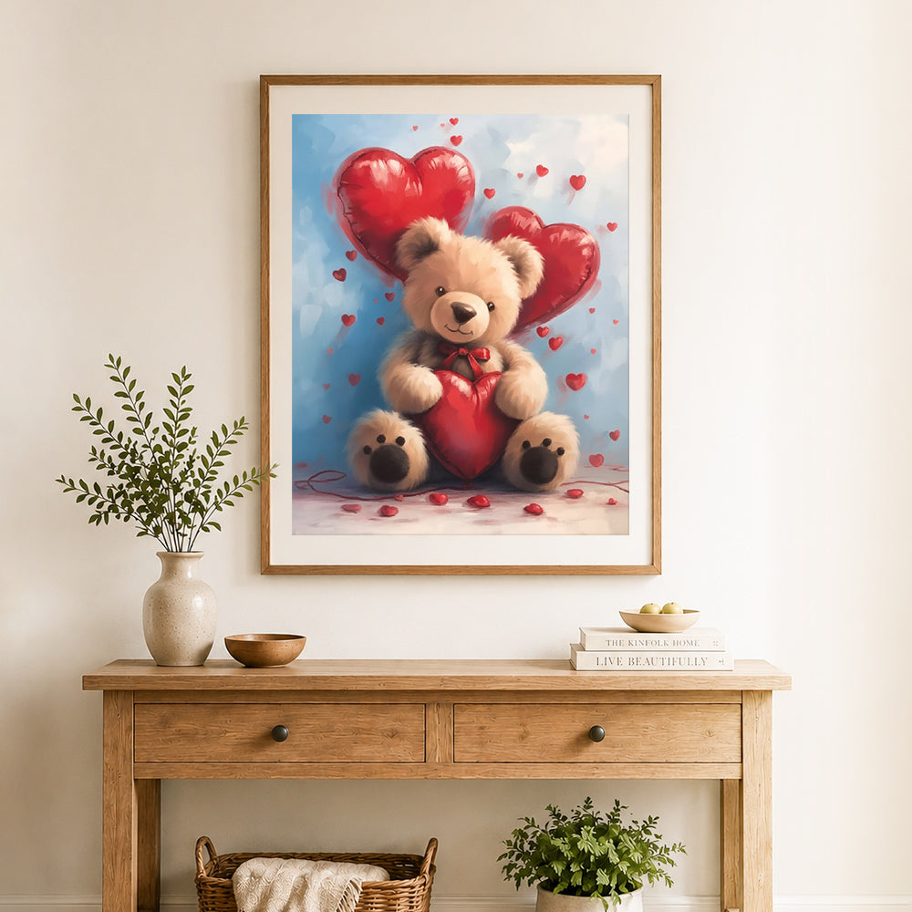 Finished teddy bear and heart balloons cross stitch artwork displayed as home decor