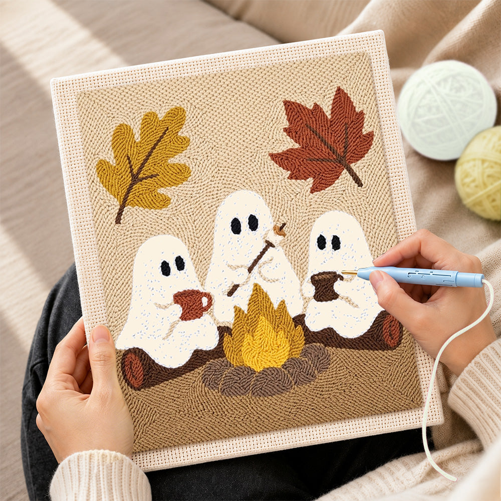 Creating handmade three ghosts around campfire punch needle artwork