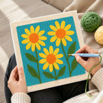 Creating handmade three simple yellow sunflowers punch needle artwork