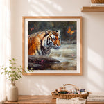 Finished tiger beside stream cross stitch artwork displayed as home decor
