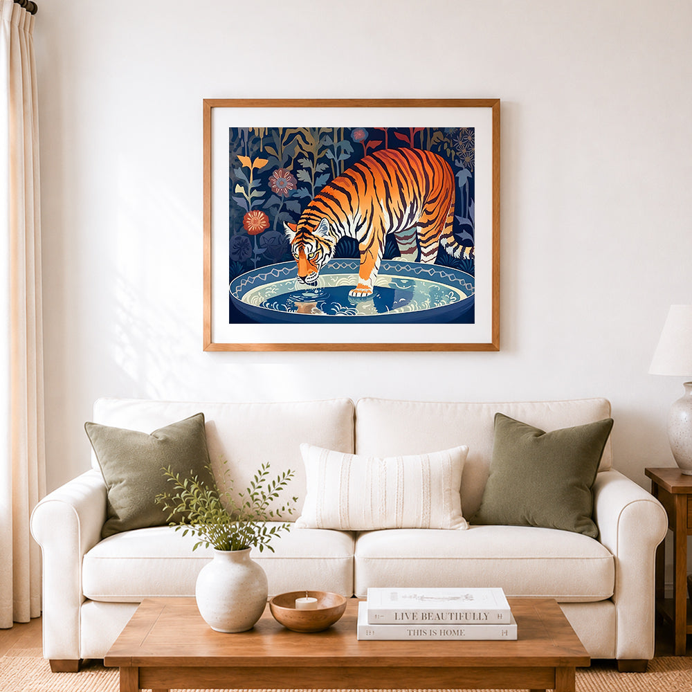 Finished tiger drinking at dusk cross stitch artwork displayed as home decor