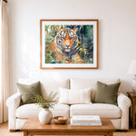 Finished tiger hidden in green foliage cross stitch artwork displayed as home decor