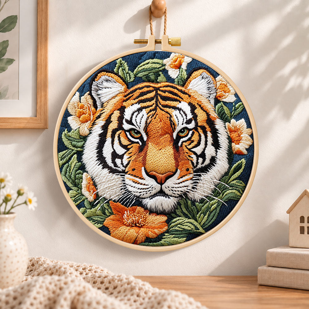 Tiger surrounded by blooms embroidery hoop wall art displayed as warm and cozy handmade home decor