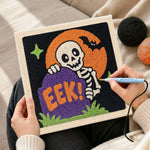 Creating handmade tombstone skeleton punch needle artwork