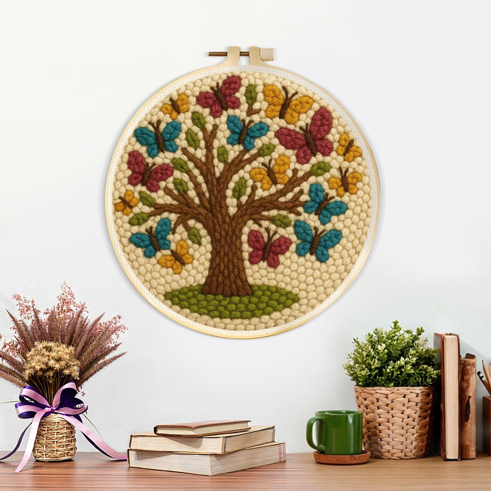 Finished tree of life with colorful butterflies artwork displayed on a wall