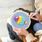 Creating handmade tri-color ice cream punch needle artwork