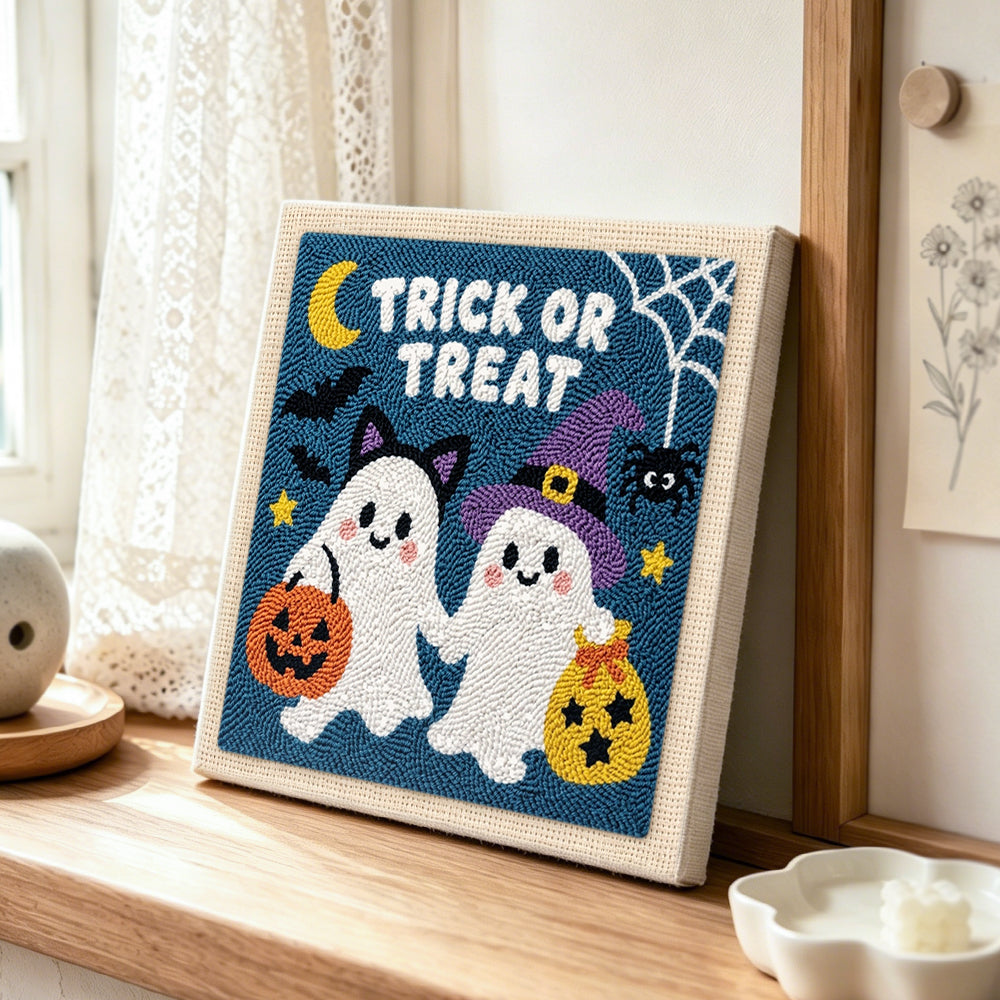 Trick or treat ghost friends punch needle artwork displayed on a table