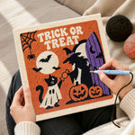 Creating handmade trick or treat halloween scene punch needle artwork