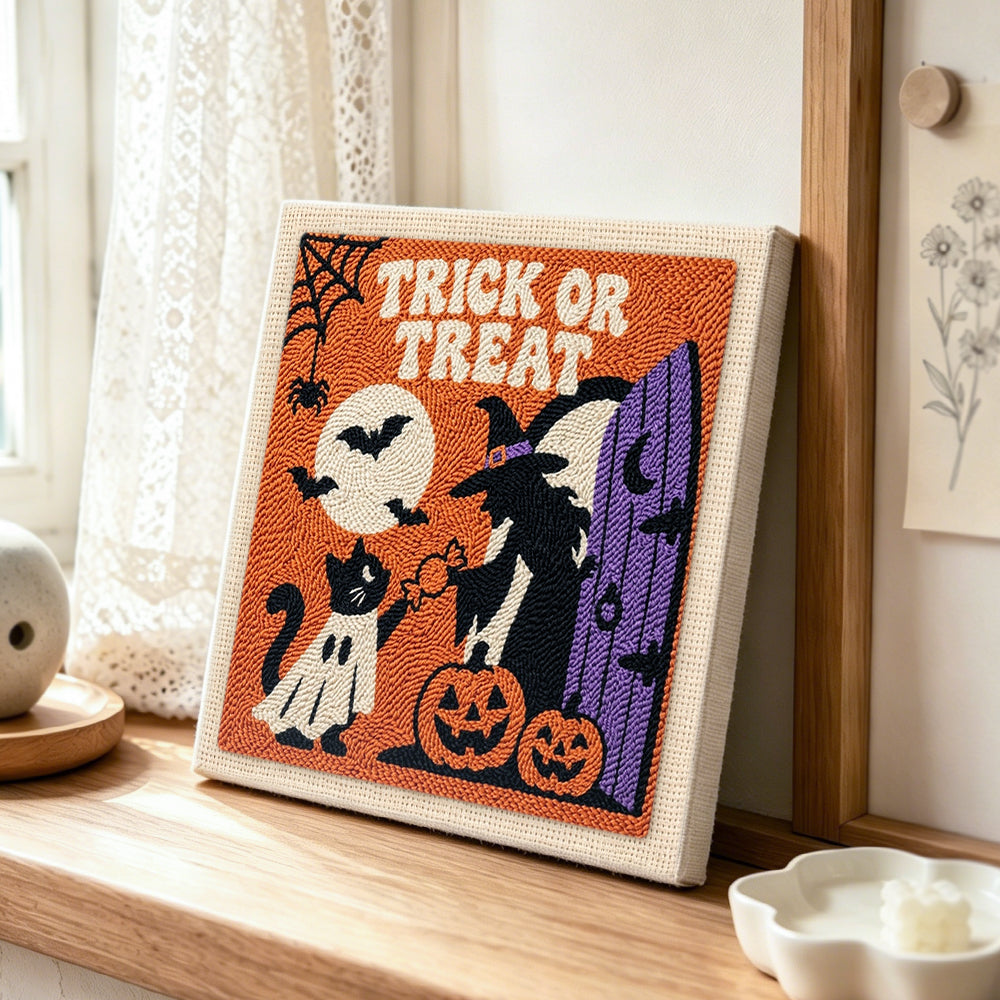 Trick or treat halloween scene punch needle artwork displayed on a table