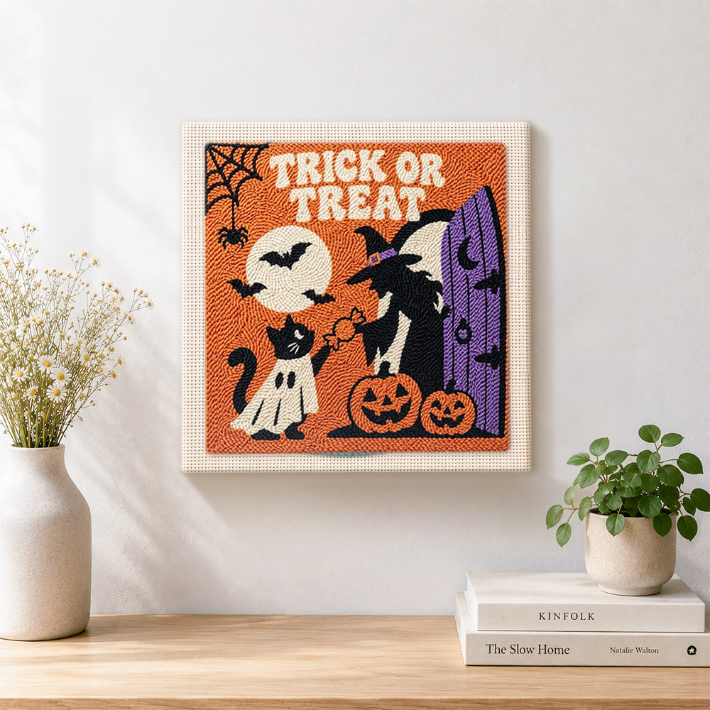 Finished trick or treat halloween scene artwork displayed on a wall