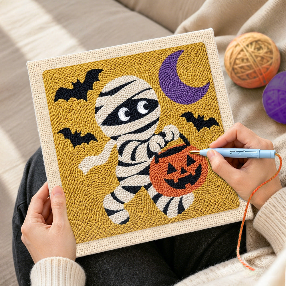 Creating handmade trick or treat mummy punch needle artwork