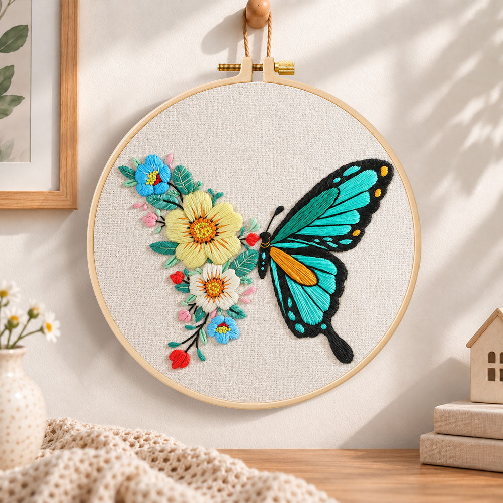 Turquoise butterfly and blooms embroidery hoop wall art displayed as warm and cozy handmade home decor