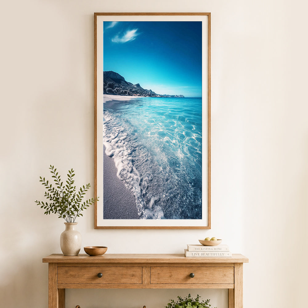 Finished turquoise coastal shore cross stitch artwork displayed as home decor