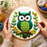 Creating the turquoise owl wool painting by hand with a felting needle