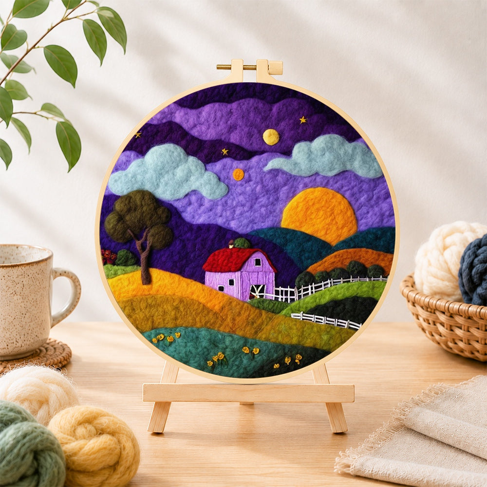 Finished twilight purple farmhouse needle felting displayed on a wooden easel