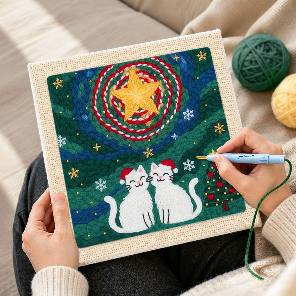 Creating handmade two cats in santa hats punch needle artwork