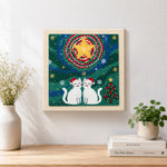 Finished two cats in santa hats artwork displayed on a wall