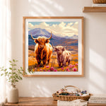 Finished two highland cows on mountain valley cross stitch artwork displayed as home decor