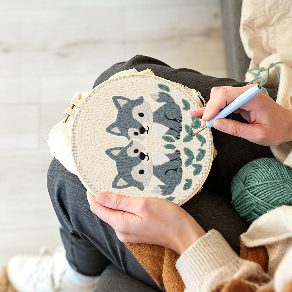 Creating handmade two little gray foxes punch needle artwork