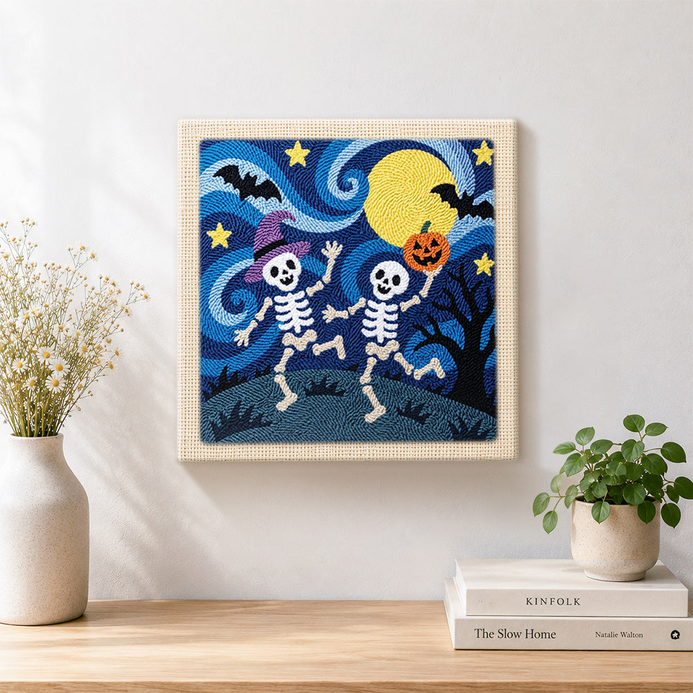 Finished two skeletons dancing at night artwork displayed on a wall