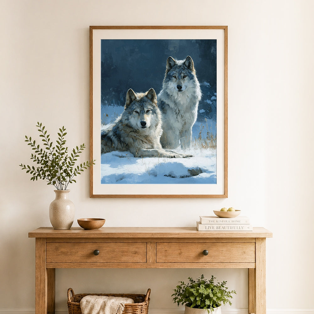 Finished two wolves in winter snow cross stitch artwork displayed as home decor