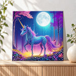 Finished unicorn in moonlit purple forest pearl diamond painting artwork displayed as holiday home decor