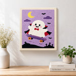 Finished vampire ghost on skateboard artwork displayed on a wall