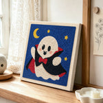 Vampire ghost punch needle artwork displayed on a table