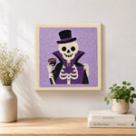 Finished vampire skeleton artwork displayed on a wall