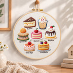 Variety of little cakes embroidery hoop wall art displayed as warm and cozy handmade home decor