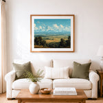 Finished vast alpine valley cross stitch artwork displayed as home decor