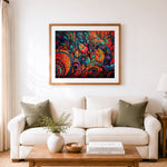 Finished vibrant bohemian floral swirls cross stitch artwork displayed as home decor