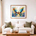 Finished vibrant brushstroke butterfly cross stitch artwork displayed as home decor
