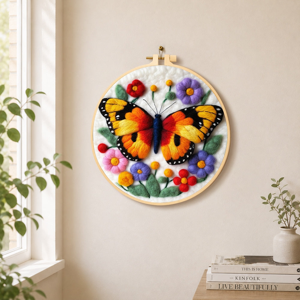 Vibrant butterfly and flowers needle felt wall art displayed in a bright home interior