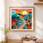 Finished vibrant colorful landscape cross stitch artwork displayed as home decor