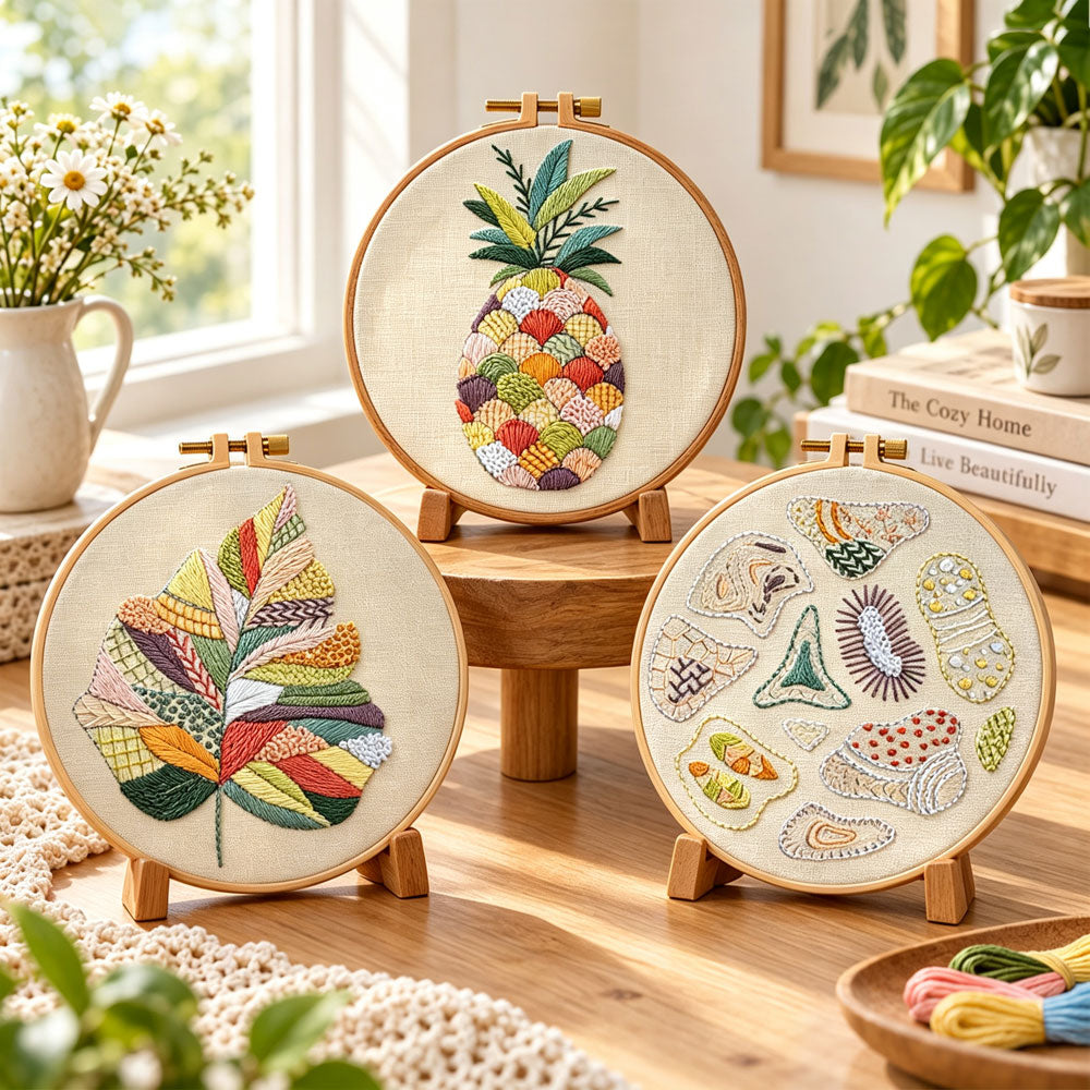 Vibrant colorful stitch art embroidery kit finished hoop displayed on a wooden stand as cozy tabletop decor