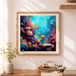 Finished vibrant coral reef ocean world cross stitch artwork displayed as home decor