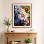 Finished vibrant daisy blooms cross stitch artwork displayed as home decor