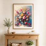 Finished vibrant floral bouquet cross stitch artwork displayed as home decor