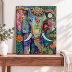 Finished vibrant floral elephant pearl diamond painting artwork displayed as home decor
