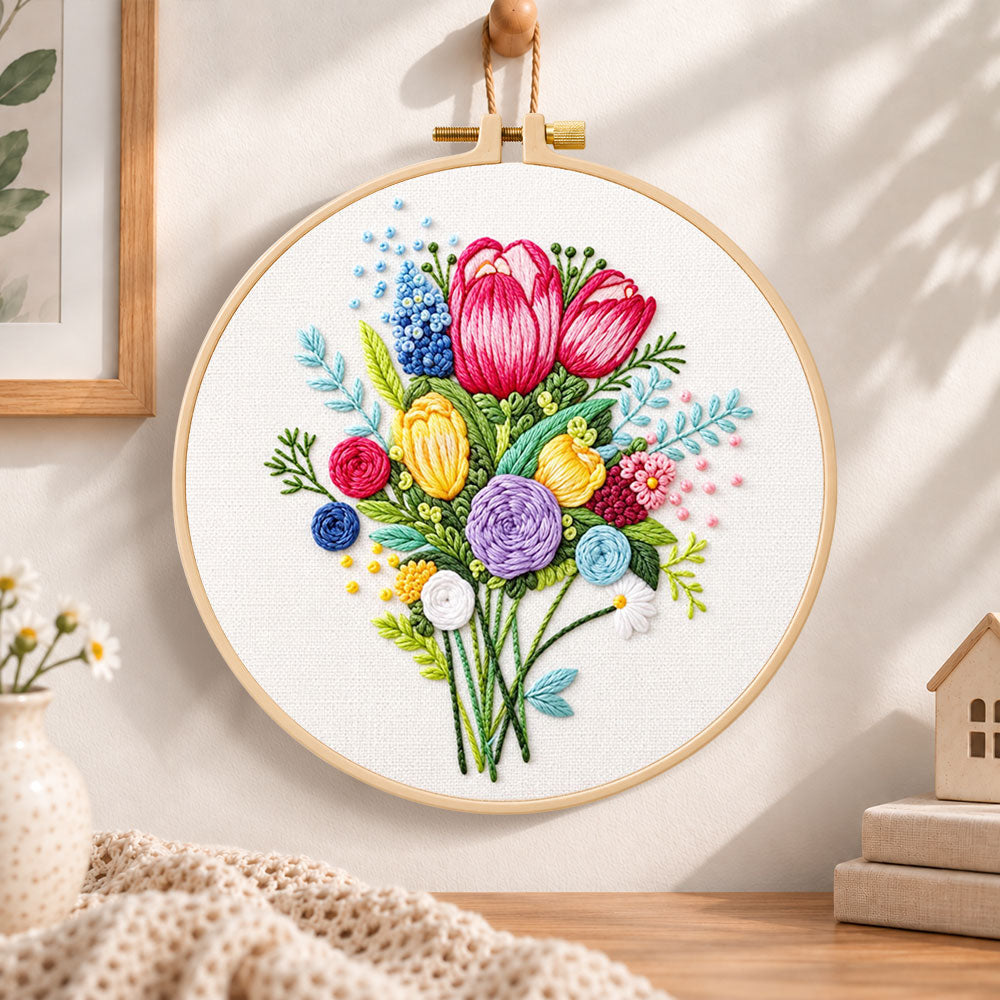 Vibrant flower bouquet embroidery hoop wall art displayed as warm and cozy handmade home decor