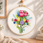 Vibrant flower bouquet embroidery hoop wall art displayed as warm and cozy handmade home decor