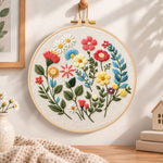 Vibrant garden sprigs embroidery hoop wall art displayed as warm and cozy handmade home decor