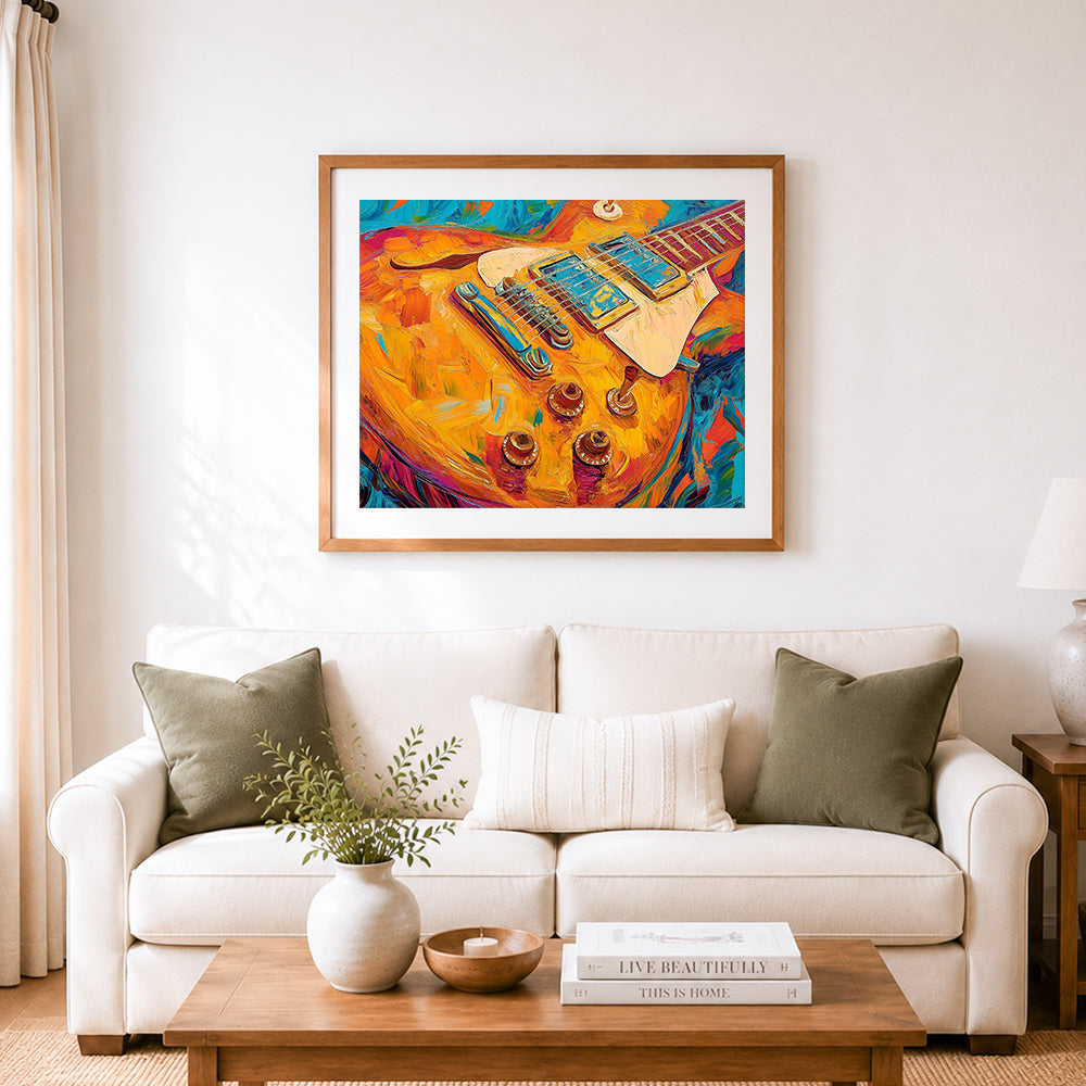 Finished vibrant guitar brushstrokes cross stitch artwork displayed as home decor